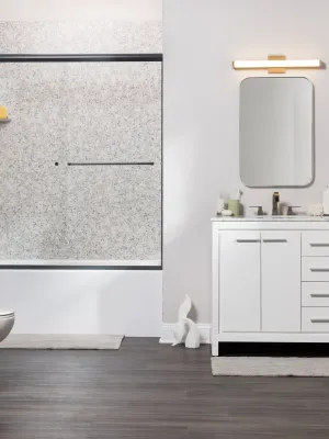 a bathroom with a tub toilet and sink