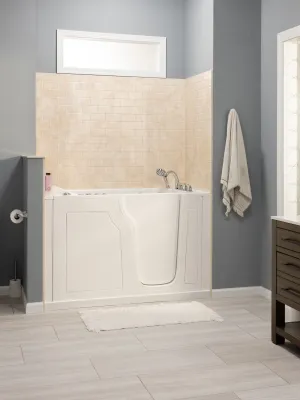 a bathroom with a tub toilet and sink