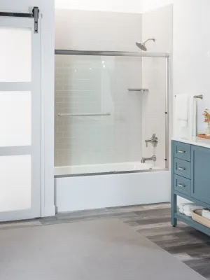 a bathroom with a blue cabinet