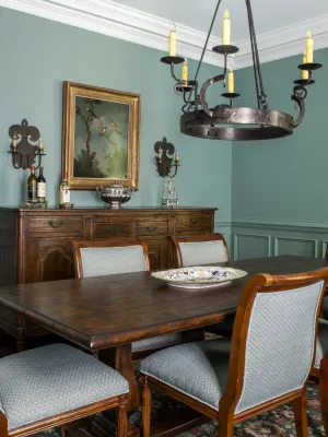 a dining room table with chairs