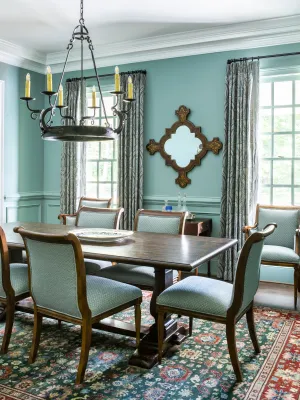 a dining room with a chandelier and a table