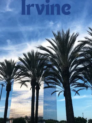 palm trees in front of a tall building in Irvine, California