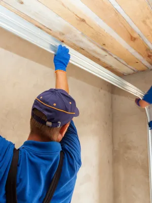 a person holding a beam