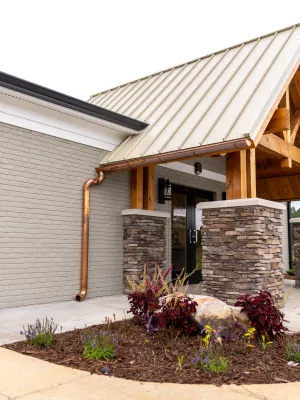 a house with a brick patio