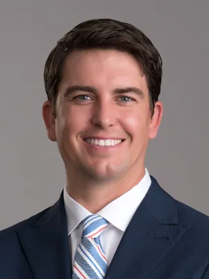 lawyer W Blake Follis in a suit smiling