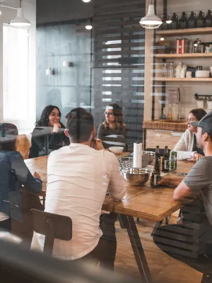 a group of people sitting at tables
