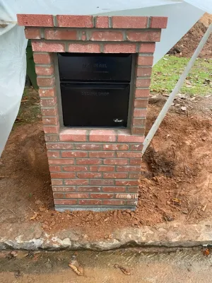 a brick oven in a brick wall