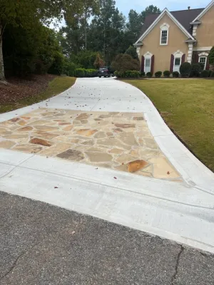 a driveway with a car parked in the driveway