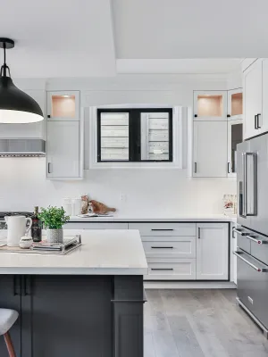 a kitchen with white cabinets