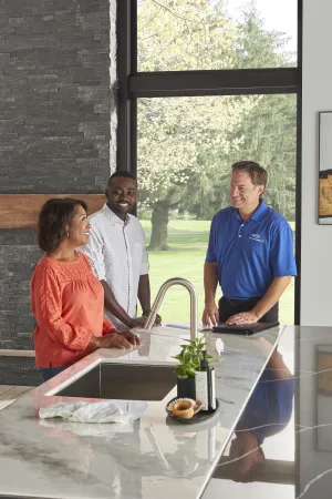 a group of people in a kitchen
