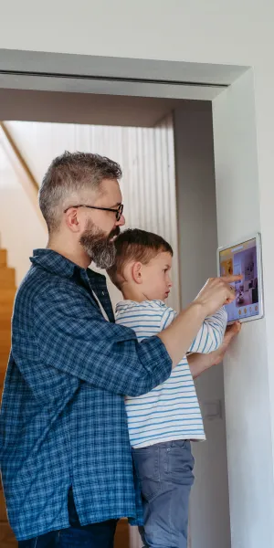 a man holding a baby