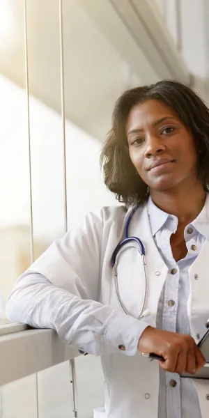 a doctor holding a clipboard