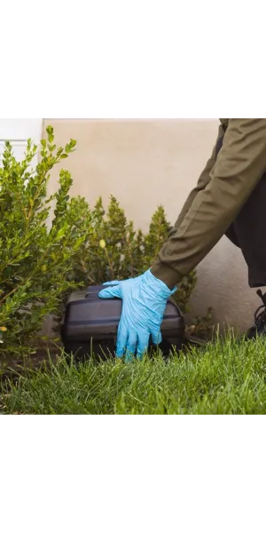 a Ridd technician inspecting equipment