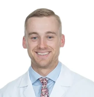 a man wearing a suit and tie