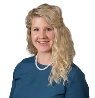 a woman smiling for the camera