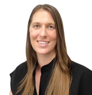 Smiling woman with long brown hair, wearing a black shirt, against a transparent background.