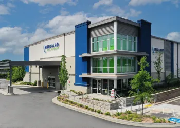 Modern self-storage building with Midgard signage