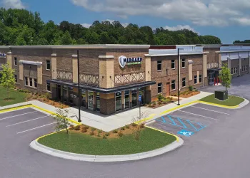 Modern self-storage building with Midgard signed entrance.