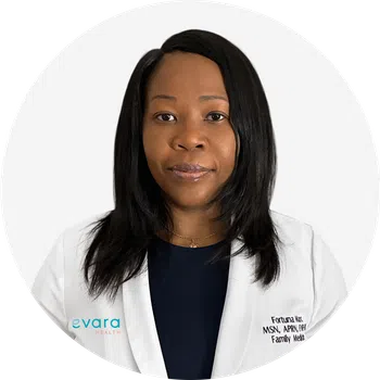 Professional female healthcare provider in white coat with Evara Health logo on plain background