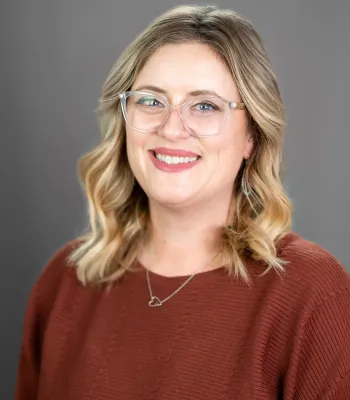 a woman wearing glasses