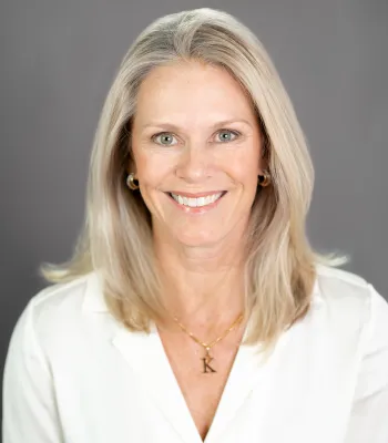 a close-up of a woman smiling