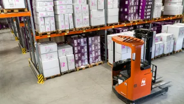 a large warehouse with shelves of products