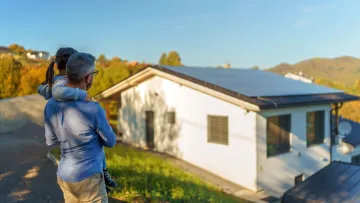 family with solar panel installation at home in Atlanta GA