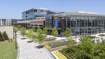 a building with a pool in front