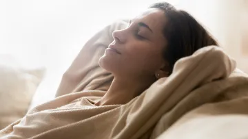 a person sleeping on a bed