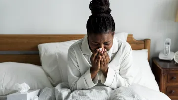 a person sitting on a bed