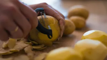 a person holding a drill