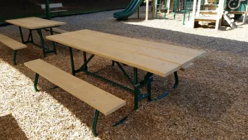 a wooden table on a playground
