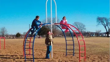 a group of people playing on a playground