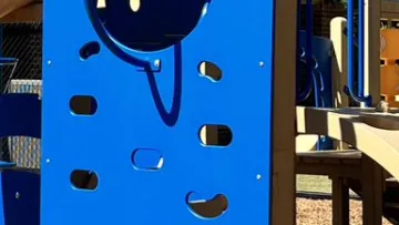 a blue and white playground slide