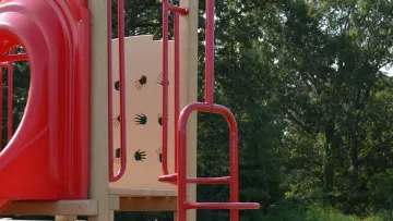 a red and white play structure