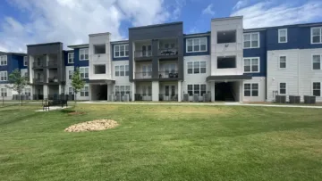 a building with a lawn in front