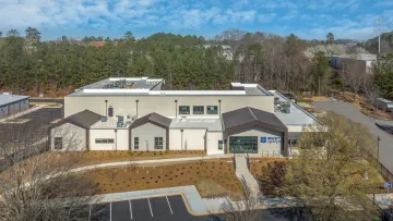 a building with a parking lot