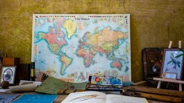 a table with books and a map