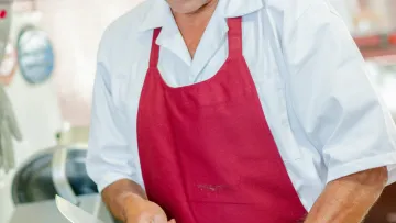 a chef holding a knife