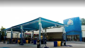 a gas station with gas pumps