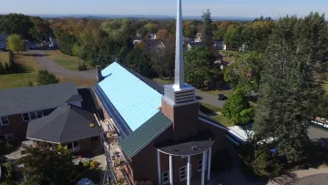 a building in south windsor connecticut with new roofing in progress