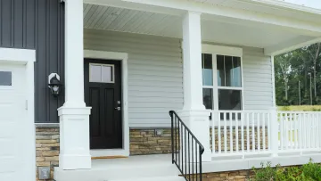 a white house with a porch