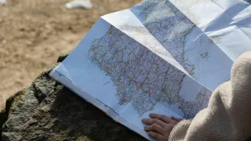 a person holding a map