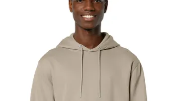 a man wearing a brown hoodie