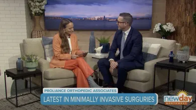 TV interview discussing latest advances in minimally invasive surgeries with two hosts seated in a studio.
