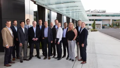 a group of people standing in front of a building