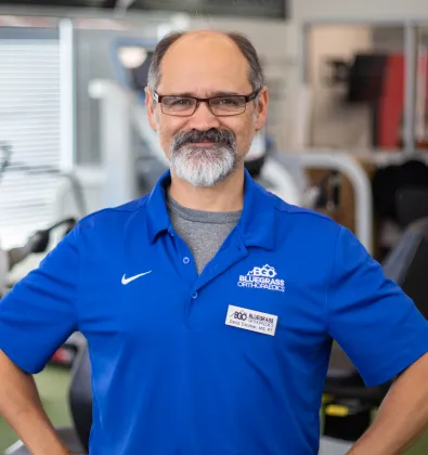 a man in a blue shirt