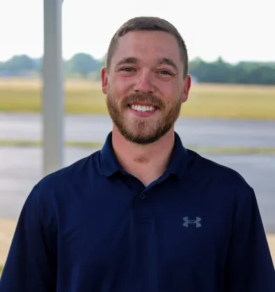 a man smiling for the camera