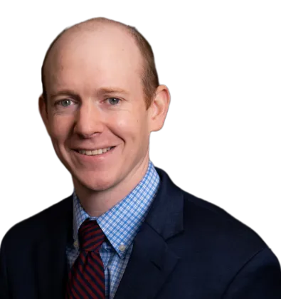 a man wearing a white shirt and red tie