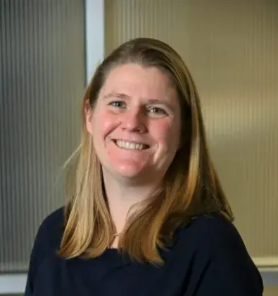 a woman in a blue shirt